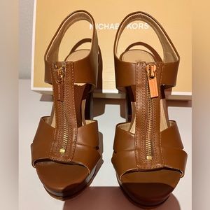 Michael Kors high heels, brown leather, with gold zippers.